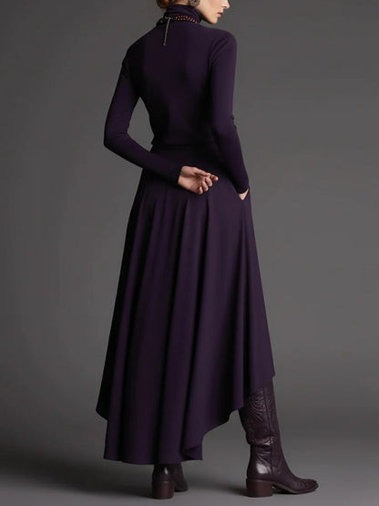 Set di Due Pezzi: Top Viola con Collo Alto e Gonna Asimmetrica