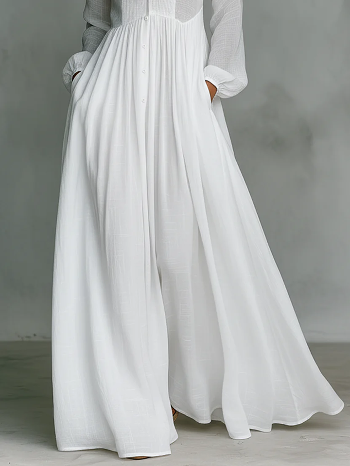 Abito lungo minimalista in patchwork con colletto alto e maniche lunghe