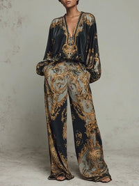 Completo Casual con Top a Stampa Floreale Barocco e Pantaloni a Gamba Larga