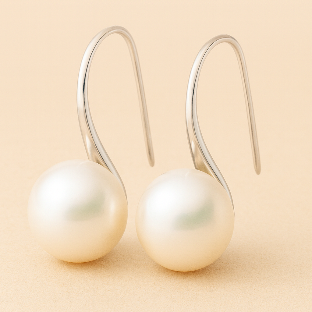 Orecchini eleganti a goccia con perle