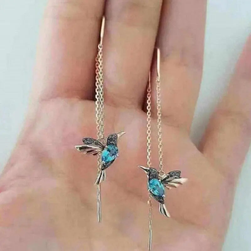 Orecchini in filigrana con colibrì in oro e cristalli