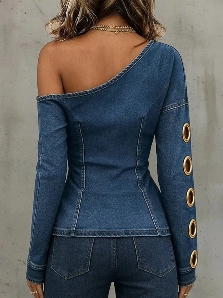 Blusa di jeans asimmetrica con anelli dorati
