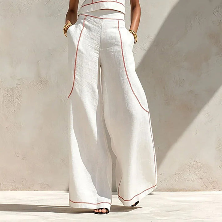 Inés Completo di Due Pezzi con Pantaloni Palazzo e Dettagli a Contrasto