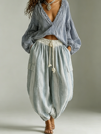 Set di due pezzi con top a maniche a lanterna a righe bohemien e pantaloni a lanterna