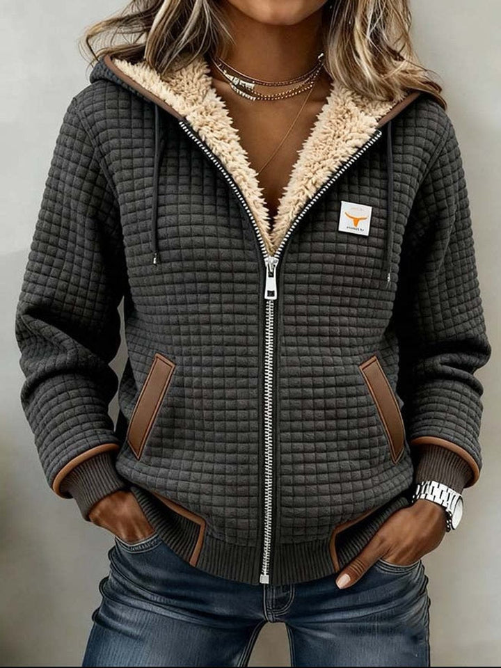 Penelope | Giacca da donna imbottita con fodera in sherpa e zip completa con cappuccio