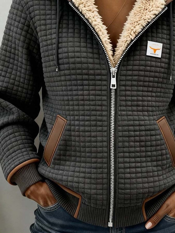 Penelope | Giacca da donna imbottita con fodera in sherpa e zip completa con cappuccio